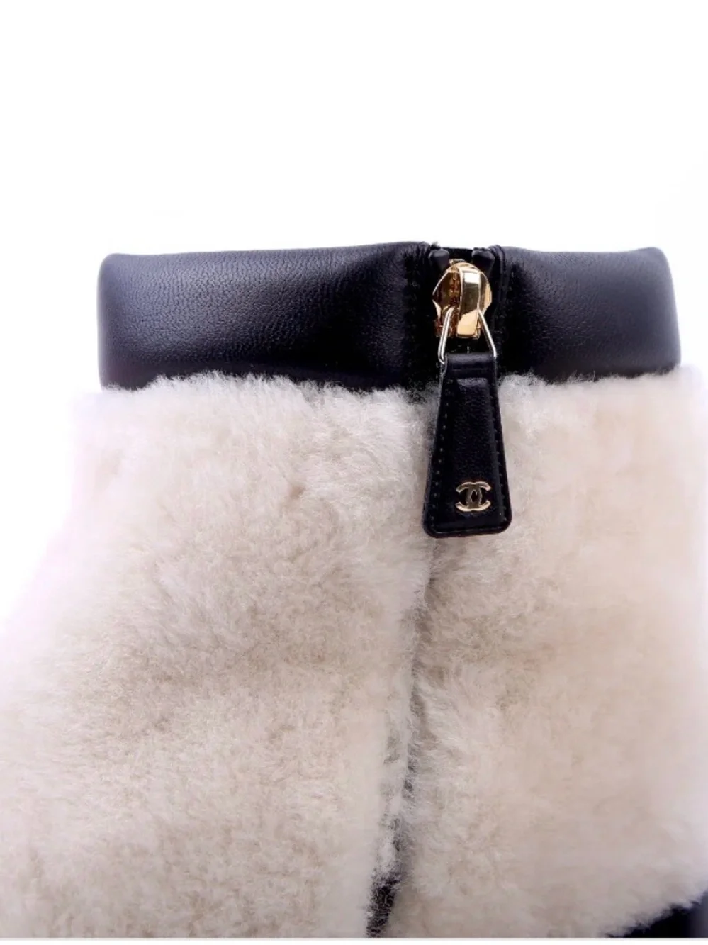 CHANEL Cream Shearling Ankle Boots with Black Leather Trim